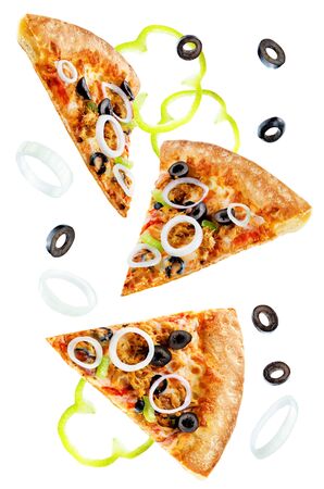 Pizza with tuna, olives, green pepper and red onion isolated. toning. selective focusの写真素材