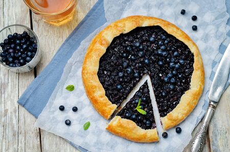 Blueberry galette with fresh blueberries. toning. selective focusの写真素材