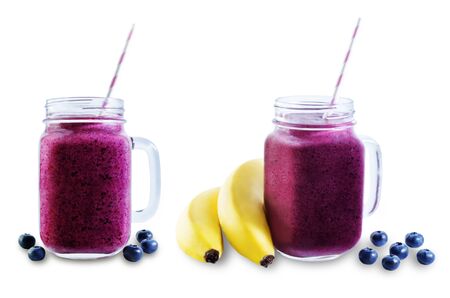 Blueberry banana smoothie on a white background. toning. selective Focusの写真素材