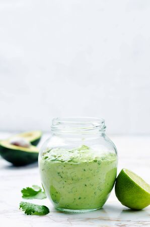 Greek yogurt avocado cilantro lime dressing. toning. selective focusの写真素材