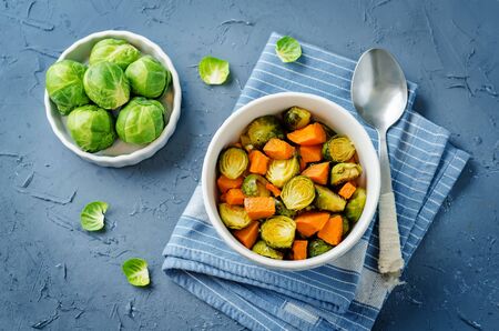 Roasted Sweet potato and Brussels Sprouts. toning. selective focusの写真素材