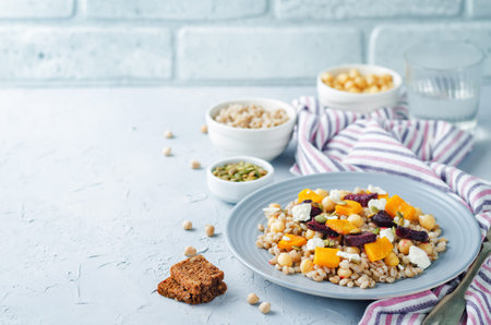 Roasted Brussels sprouts dried cranberries walnuts barley salad.の写真素材