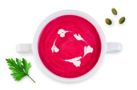 Beetroot soup in white bowl on a white isolated backgroundの写真素材