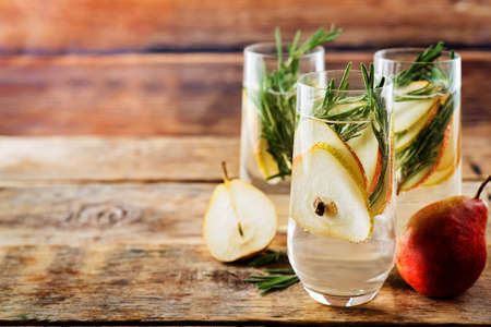 Pear rosemary cocktail with fresh pears. toning. selective focusの写真素材