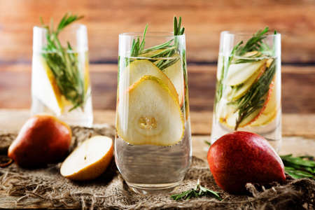 Pear rosemary cocktail with fresh pears. toning. selective focusの写真素材