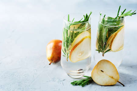 Pear rosemary cocktail with fresh pears. toning. selective focusの写真素材