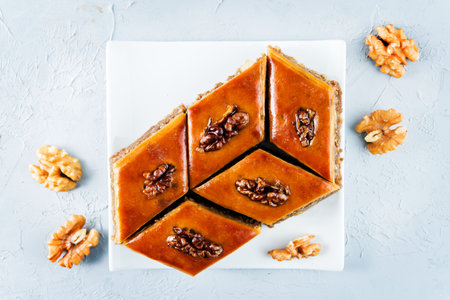 walnut baklava with glasses of tea. turkish traditional delight. toning