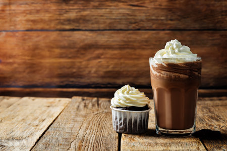 Dark hot chocolate with whipped cream. toning. selective focusの写真素材