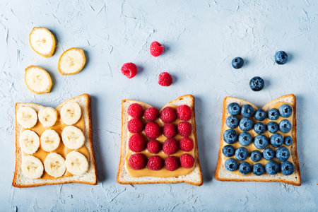 Peanut butter sandwiches with fruits. toning. selective focusの写真素材
