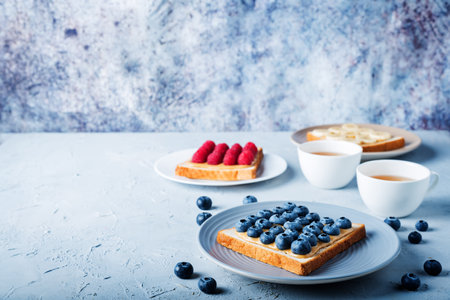 Peanut butter sandwiches with fruits. toning. selective focusの写真素材