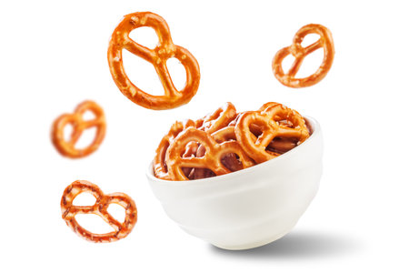 Pretzel with salt on a white isolated background. toning. selective focusの写真素材