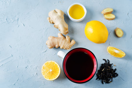 Cup of black tea with honey, lemon and ginger. the toning. selective focusの写真素材