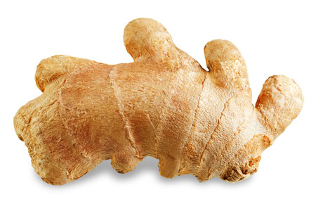 ginger root piece on white isolated background. toning. selective focus