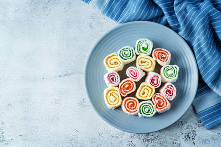 Turkish delight, Oriental sweetness on a plate with tea. toning. selective focusの写真素材