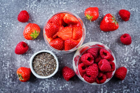 Greek yogurt Chia seeds strawberry and raspberry parfait. toning. selective focusの写真素材