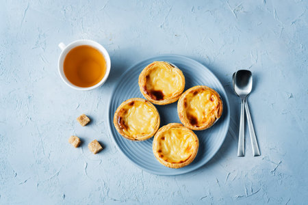 Portuguese custard pies, Pastel de Nata or Pastel de Belem. Traditional portuguese pastryの写真素材