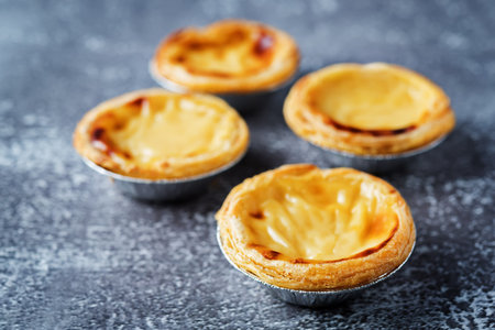 Portuguese custard pies, Pastel de Nata or Pastel de Belem. Traditional portuguese pastry