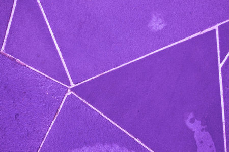 Purple background with different shapes and white stripes. Paving tiles rain field in lilac color