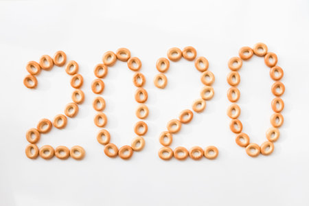 2020 made of cookies on a white background. christmas background for lettering