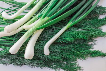 Fresh dill and green onions with vegetable garden close-up, top view.Greens for vitamin smoothie,healthy eating concept.の写真素材