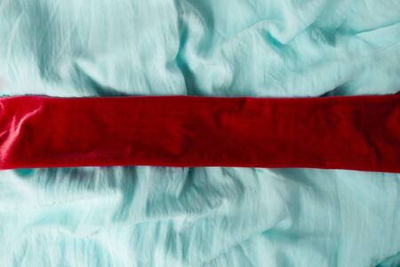  Blue satin with cotton and velvet in elegant folds shimmers with light and deep rich color. Top view, Flat lay.の写真素材