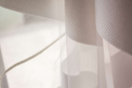 transparent chiffon tulle textured background with white stripes.の写真素材