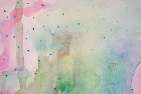 Abstract watercolor. Stains of pink, blue, green, yellow watercolor stains flowing into each other. Watercolor paper textureの写真素材