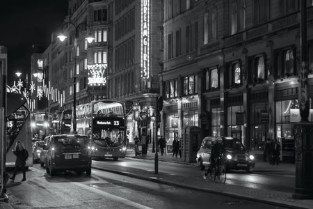 LONDON - NOVEMBER 17, 2016: Strand street with Routemaster diesel-electric hybrid double deck bus. Black and white photographyのeditorial素材