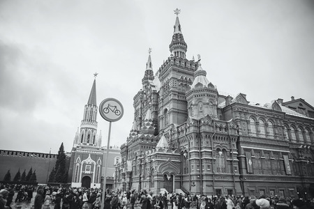 MOSCOW - JANUARY 02, 2017: Many tourists walk on Red Square. Historical Museum Building. Black and white photographyのeditorial素材