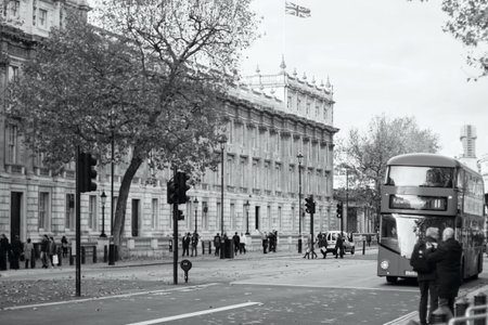 LONDON - NOVEMBER 16, 2016: busy traffic on Fulham Broadway with Routemaster diesel-electric hybrid...