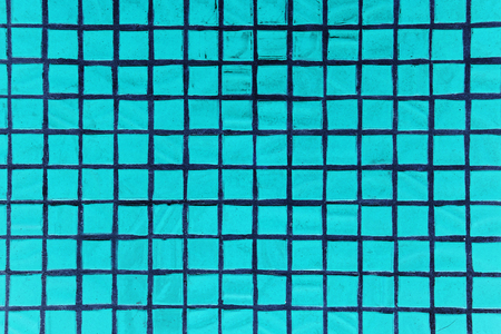 Texture of fine little ceramic tiles background. Blue floor tilesの写真素材