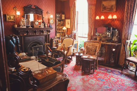 LONDON - AUGUST 24, 2017: The Sherlock Holmes museum is located on Baker Street and is dedicated to the fictional detective Sherlock Holmes. Inside the Sherlock Holmes Museum. Victorian styleのeditorial素材