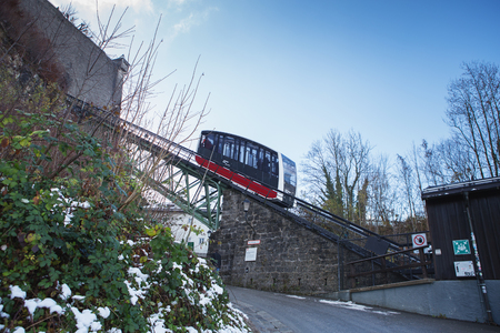 Salzburg, Austria  - November 28, 2018: A funicular railway car in its way to Hohensalzburg Fortress.The Festungsbahn is a funicular railway providing access to Hohensalzburg Fortress.のeditorial素材
