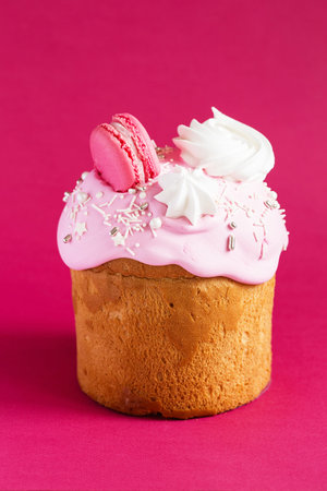 Easter Cake - Russian and Ukrainian Traditional Kulich decorated with macarons and marshmallows on...