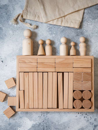 Wooden Toy Construction with ecologically wooden blocks manufactured from sustainable timbers. Wood elements for kids mental development and education. Montessori toysの写真素材