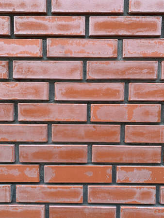 Wall with red bricks. old brick wall background. grunge brick background textureの写真素材