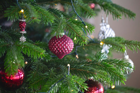 New year cozy home interior with Christmas tree and garlands. Christmas decoration in the houseの写真素材