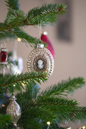 New year cozy home interior with Christmas tree and garlands. Christmas decoration in the houseの写真素材
