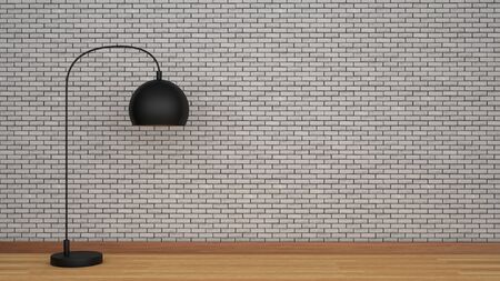 Brick wall and wooden floor with black lampの写真素材