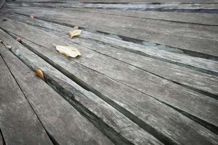 Old gray  wood plank at an angle background textureの写真素材