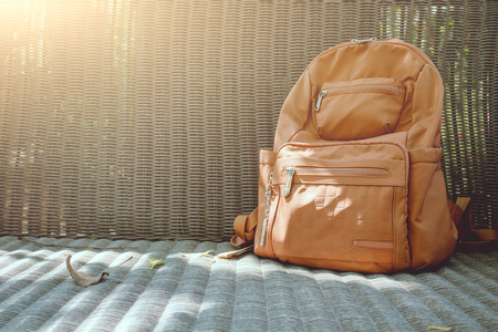 Brown backpack on wicker chair
の写真素材