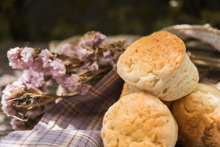 Homemade fresh classic scone on wood backgroundの写真素材
