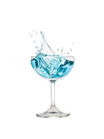 Champagne Coupe Glass with blue water splashの写真素材
