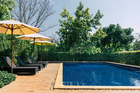 Relaxing area beside swimming pool
