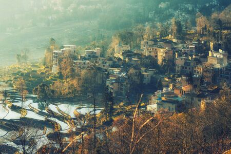 Small village and Terraced rice fields of YuanYang , China in the morningの写真素材