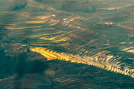 Hani Terraced rice fields of YuanYang, China during the golden hourの写真素材