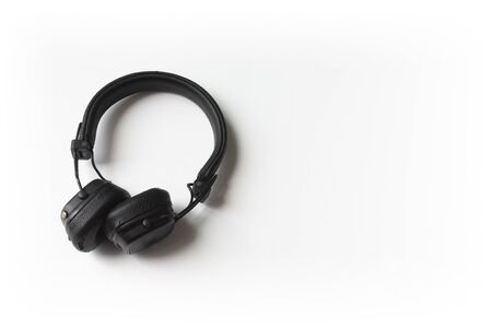 Black headphone on white background. flat lay.の写真素材