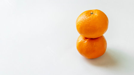 Fresh orange fruit isolated on white background.の写真素材