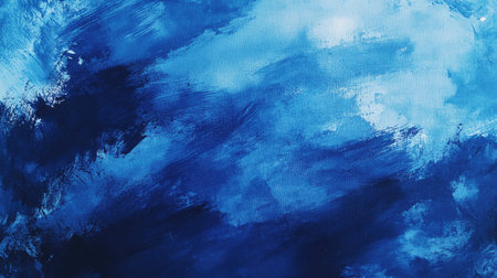 Artistic flat lay showcasing rich blue watercolor paints and expressive brushstrokes on a textured canvas, inviting creative exploration and vibrant artistic expression.の素材