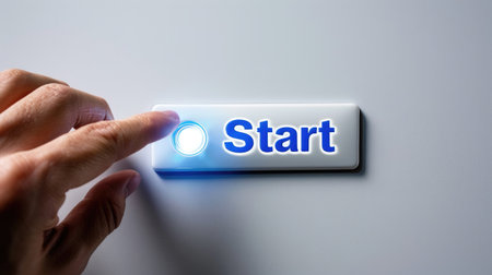 A close-up view of a human hand pressing a start button on a touchscreen device. This image symbolizes innovation and modern technology, inviting action and engagement.の素材
